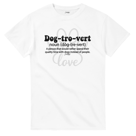 White T-shirt featuring the phrase “Dog-tro-vert — noun (dôg-tre-vert): A person that would rather spend their quality time with dogs instead of people,” printed in bold black text with a subtle paw print design behind it.