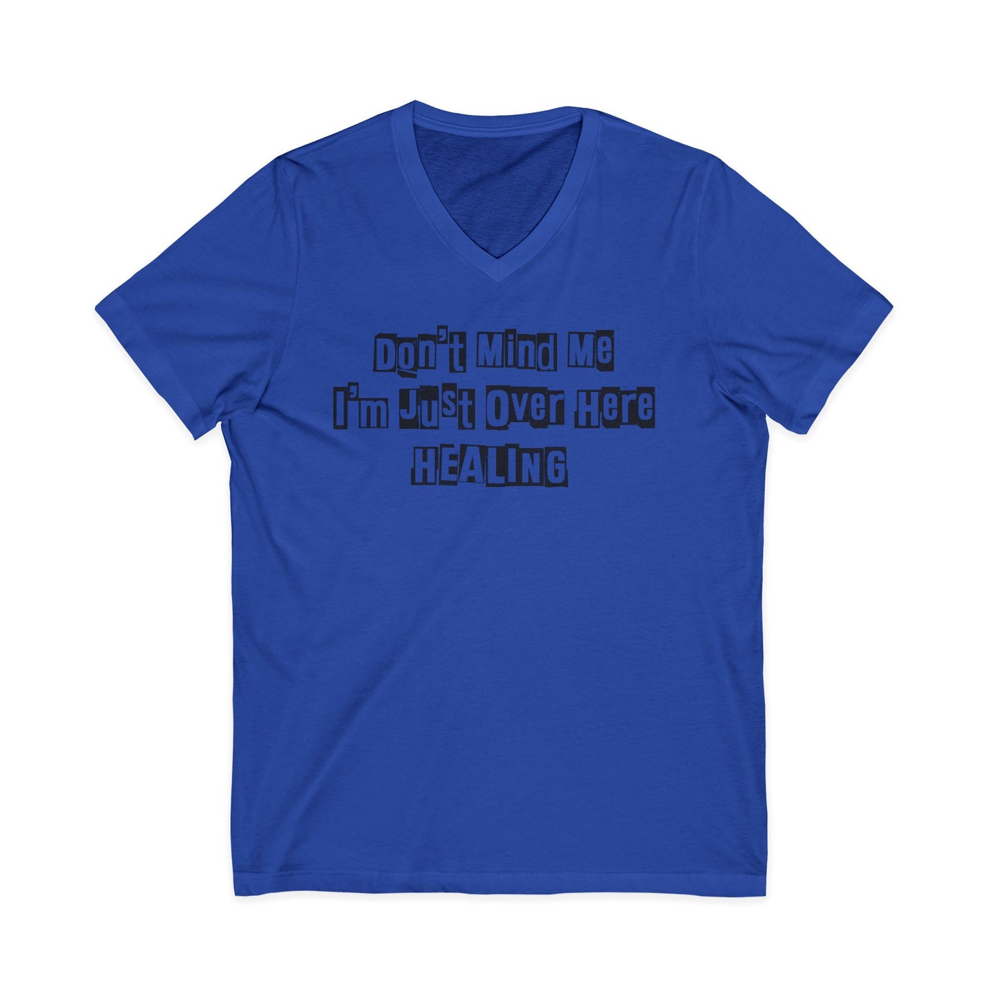 Royal blue JohnT V-neck T-shirt with the printed text “Don’t Mind Me I’m Just Over Here Healing” displayed flat on a plain background.