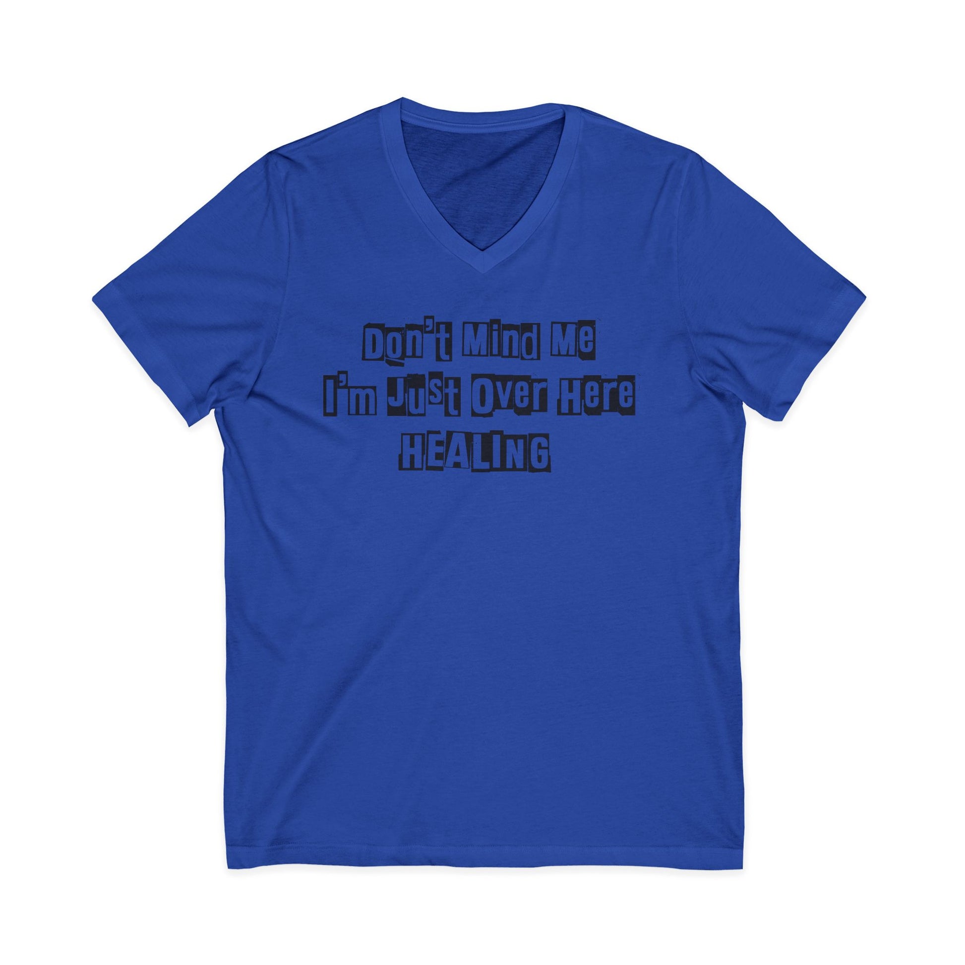 Royal blue JohnT V-neck T-shirt with the printed text “Don’t Mind Me I’m Just Over Here Healing” displayed flat on a plain background.