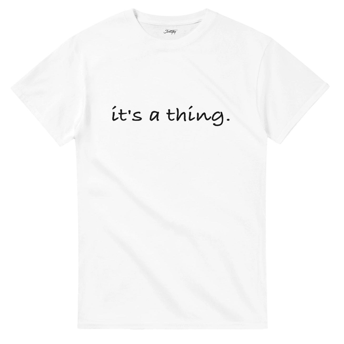 White minimalist T-shirt with the phrase “it’s a thing.” printed in simple black text on the front, representing humor, casual confidence, and modern everyday style.