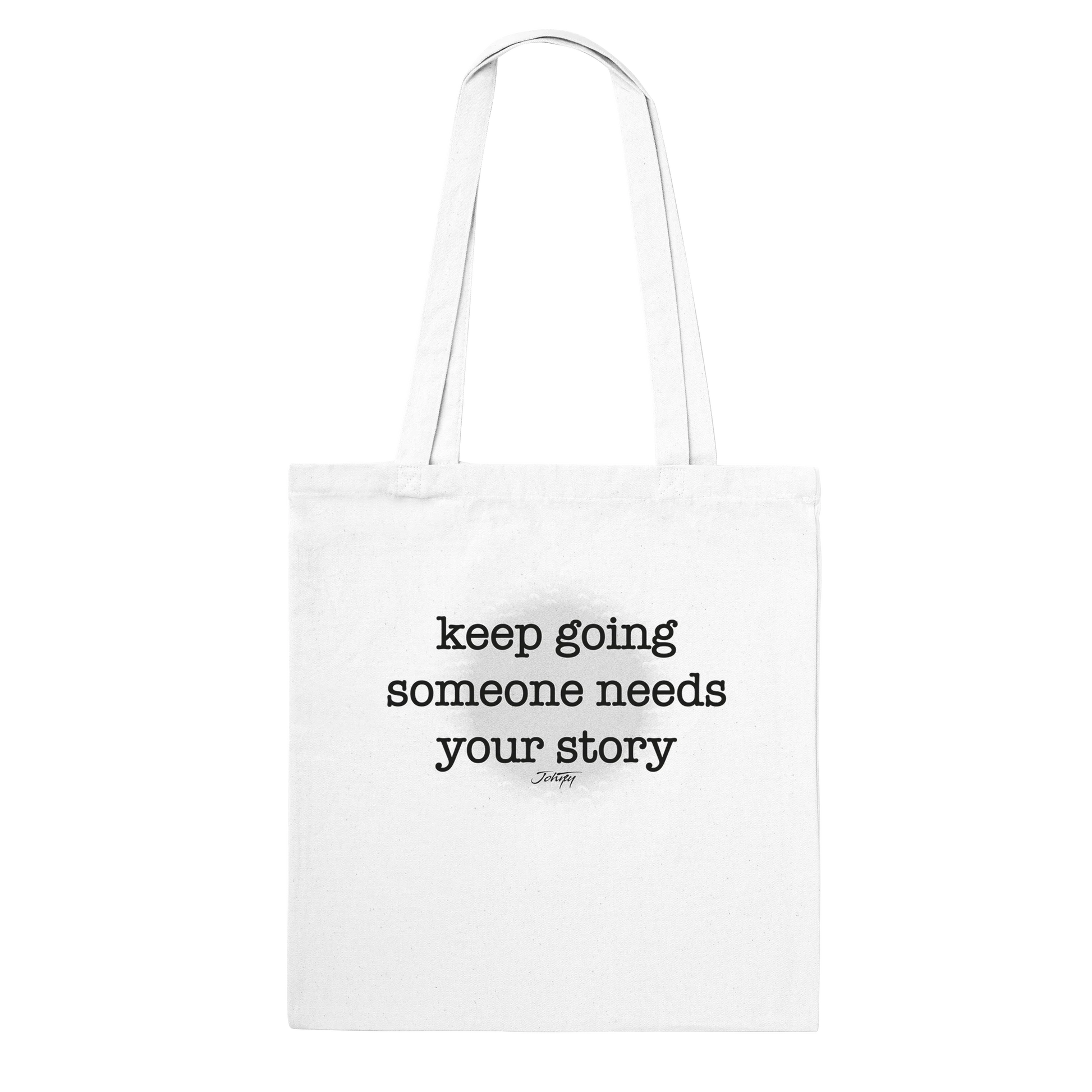 Johny-T “Keep Going Someone Needs Your Story” inspirational white tote bag shown in a clean high-resolution front-view studio mockup.