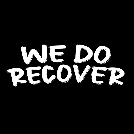 JohnyT We Do Recover bold white brush typography on black background recovery message tote bag design