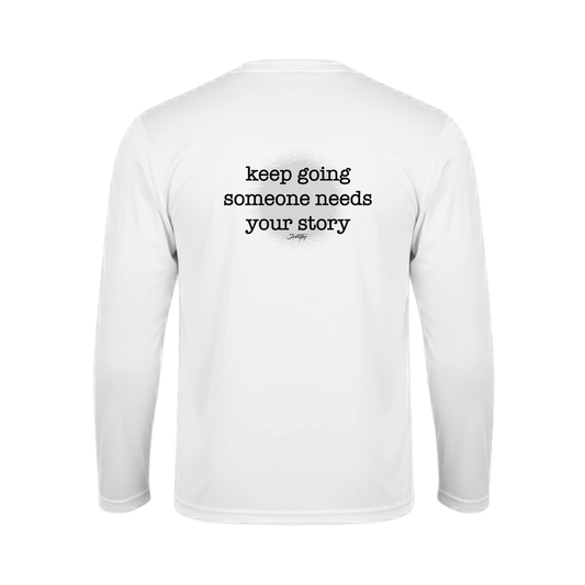 White long-sleeve shirt with the motivational text “keep going someone needs your story” printed on the back.