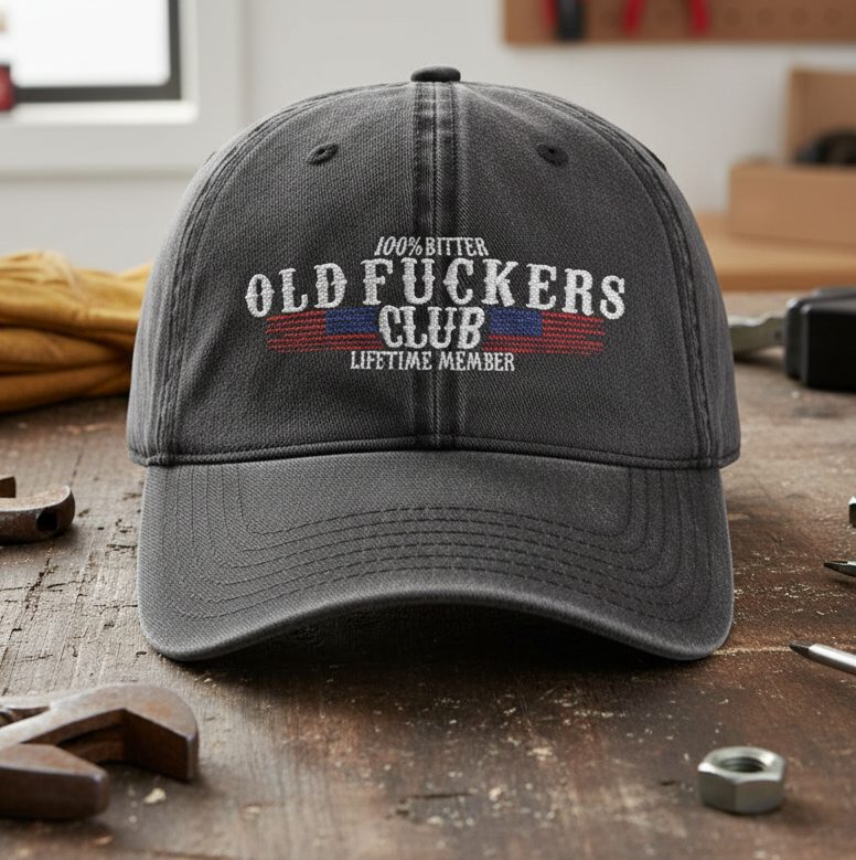 Old Fuckers Club lifetime member dad hat displayed in a workshop lifestyle setting with embroidered design, Johny-T apparel