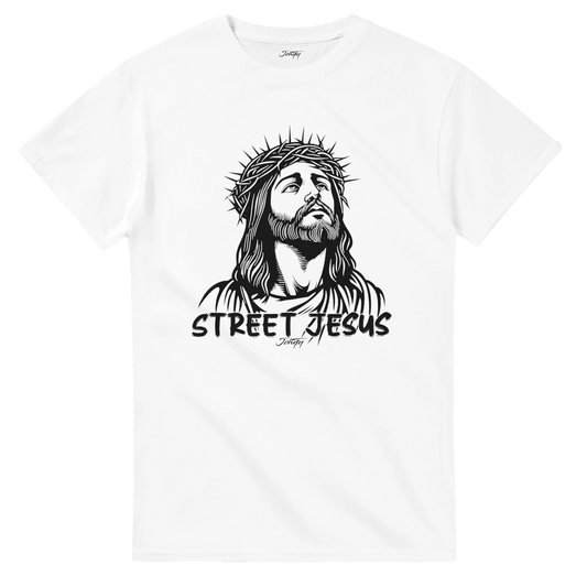 White T-shirt featuring a bold black illustration of Jesus wearing a crown of thorns with the words “Street Jesus” written below in a graffiti-style font.
