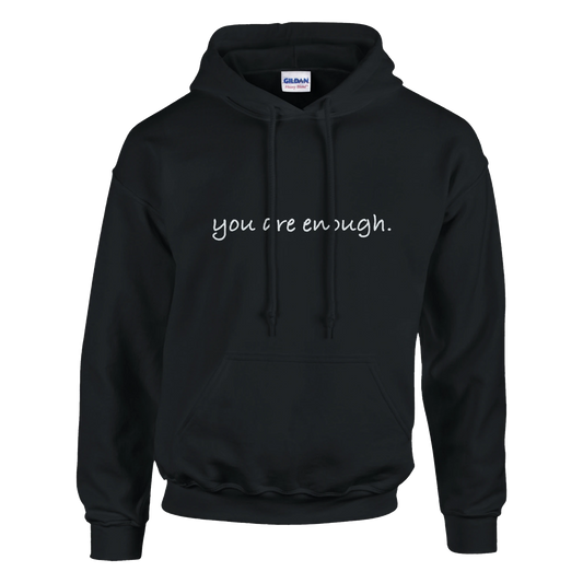Black hoodie featuring minimalist text that reads, “you are enough.” A cozy and motivational sweatshirt promoting self-love, confidence, and positivity — perfect for casual, everyday wear.