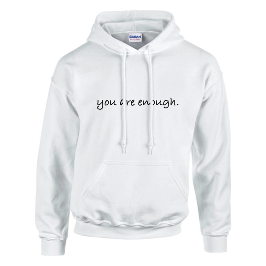 Minimalist white hoodie featuring the motivational quote “you are enough.” in black script font. A cozy and inspiring unisex sweatshirt designed to promote self-love, confidence, and positive mental health.